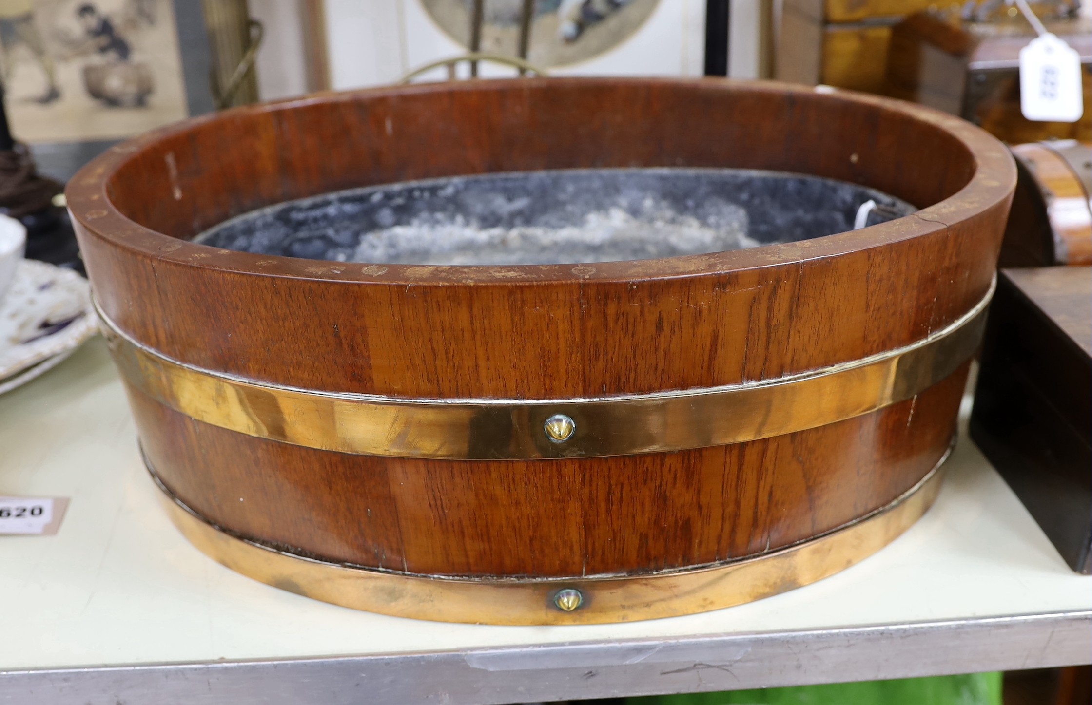 A Lister copper banded mahogany wired planter. 46cm wide